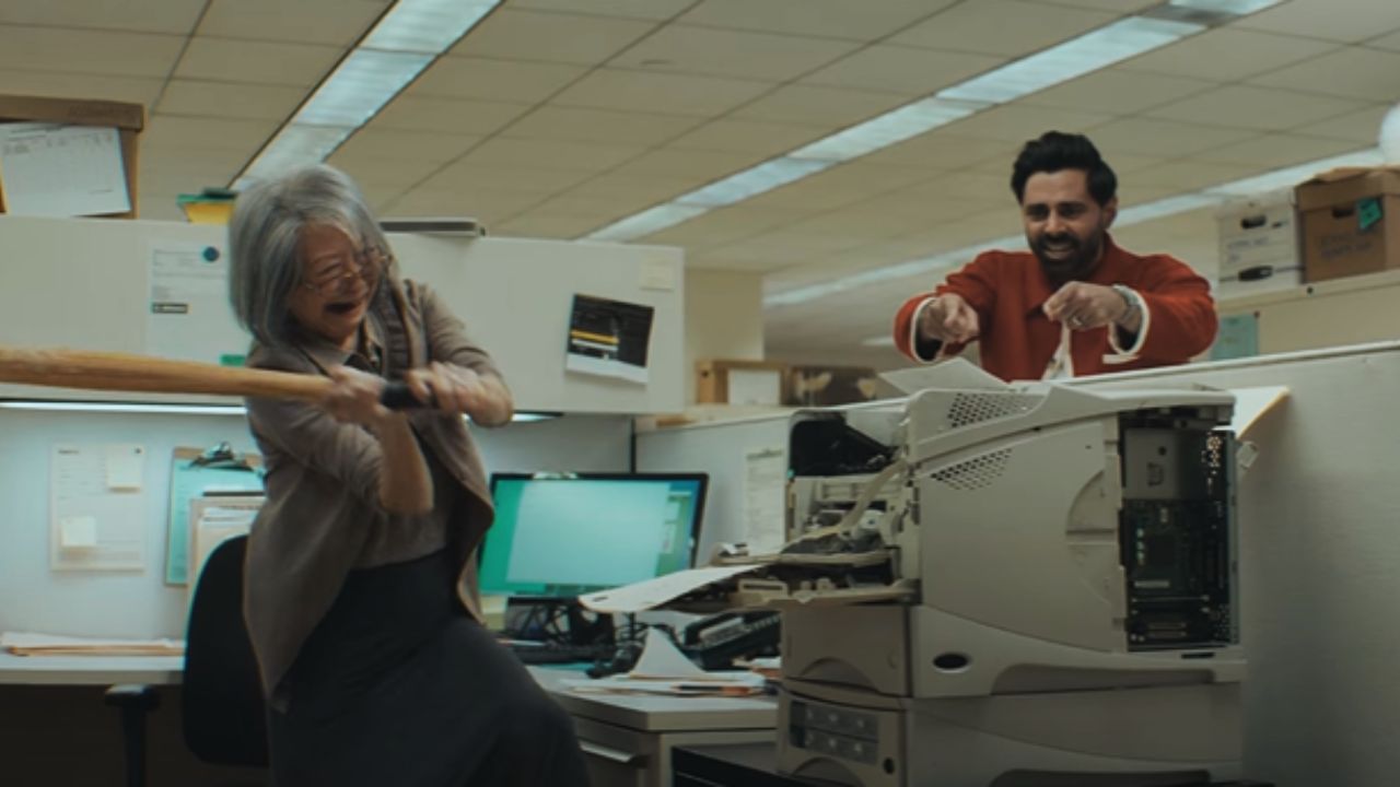 In the second spot, Hasan Minhaj is seen talking to people about the importance of Acrobat and liberating them from the hassle of using paper and switching to the software. (Still from the ad)