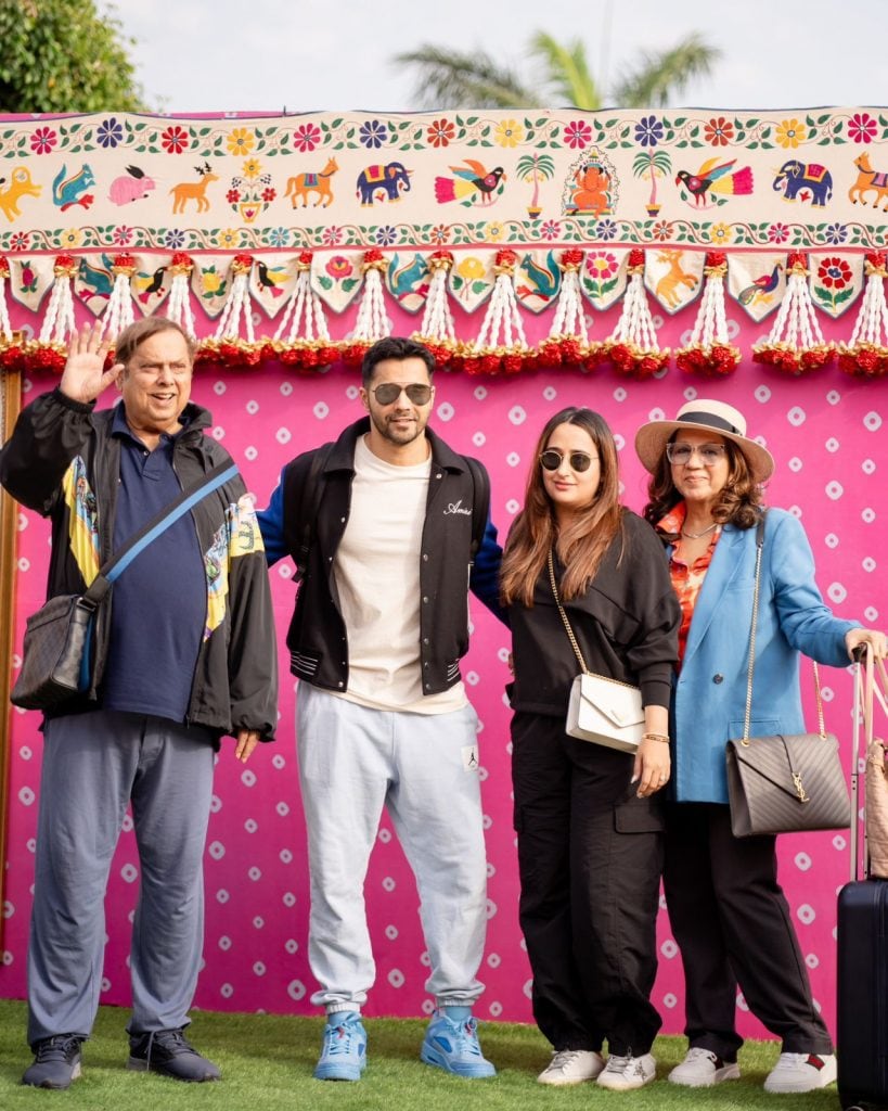 Varun Dhawan along with family - wife Natasha Dalal, father David Dhawan and mother Karuna Dhawan arrive in Jamnagar 