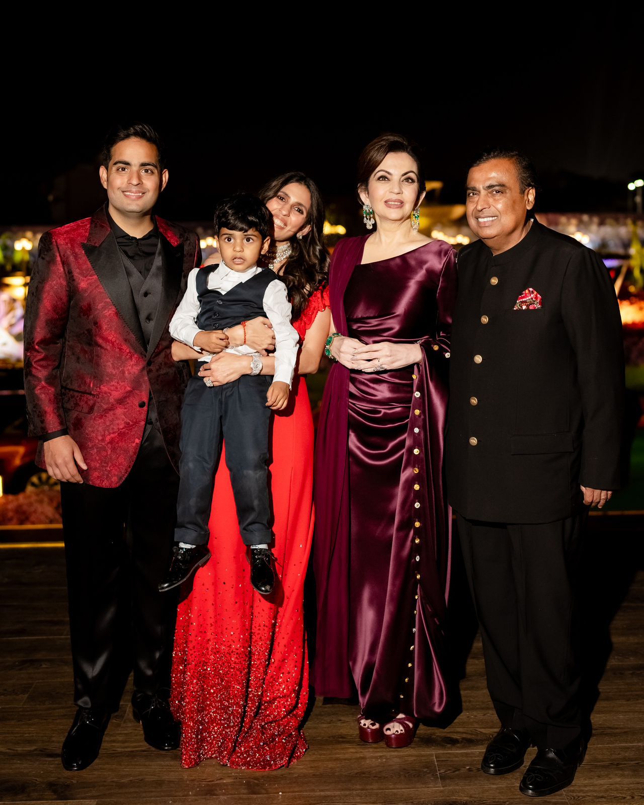 Mukesh Ambani and Nita Ambani with Akash Ambani and Shloka Mehta.