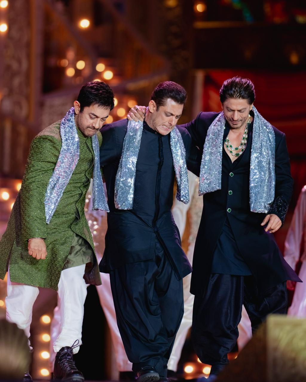 From left to right: Aamir Khan, Salman Khan and Shah Rukh Khan shaking their legs at the couple's pre-wedding festivity.