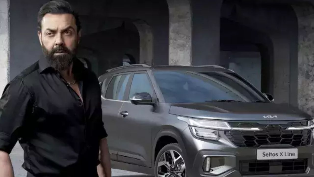 The teaser begins with Bobby Deol activating the New Seltos X-Line using the Kia Connect application on his watch, emphasizing its advanced technology and seamless connectivity.