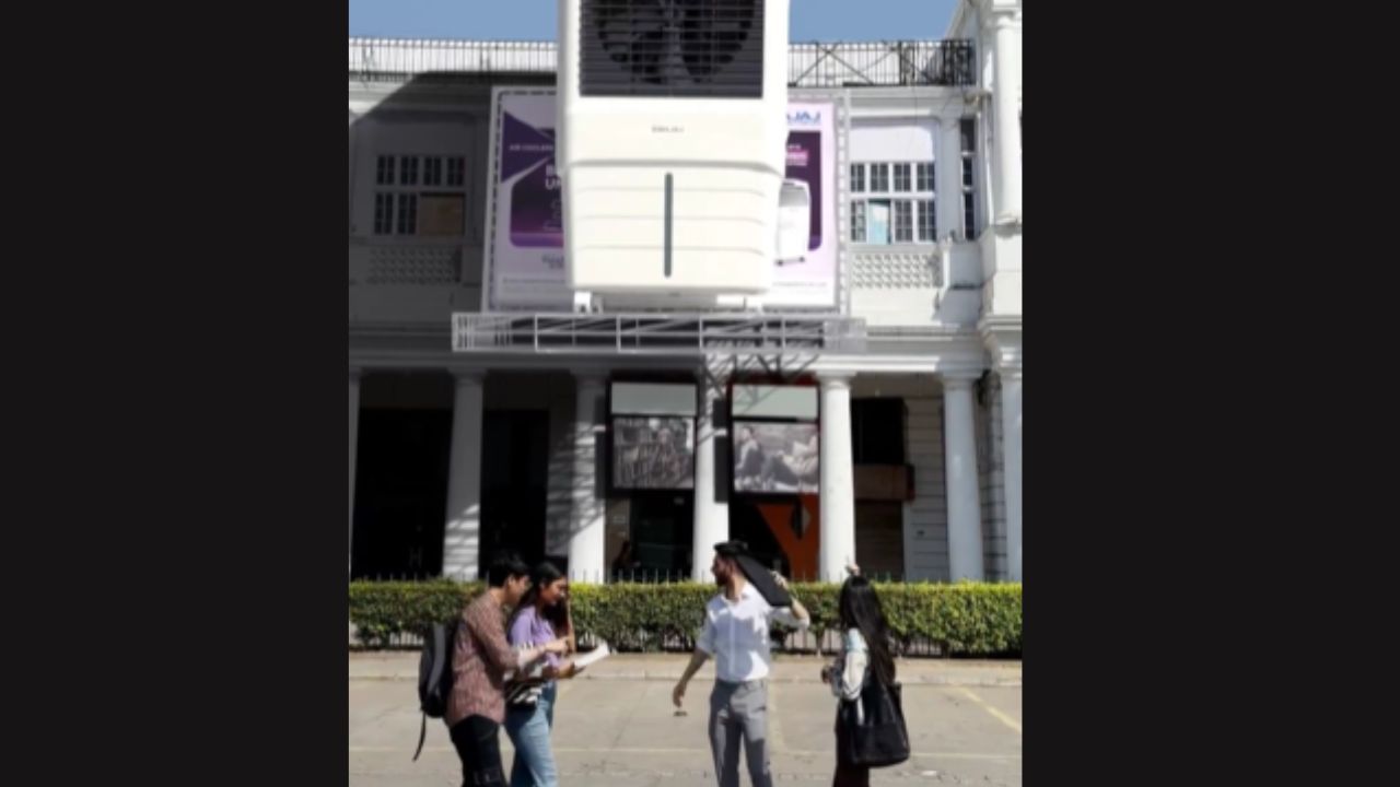 While the extreme heat drains one and all, a larger-than-life BAJAJ air cooler emerges from a billboard and delivers a strong gush of refreshingly cool air. (Still from the video)