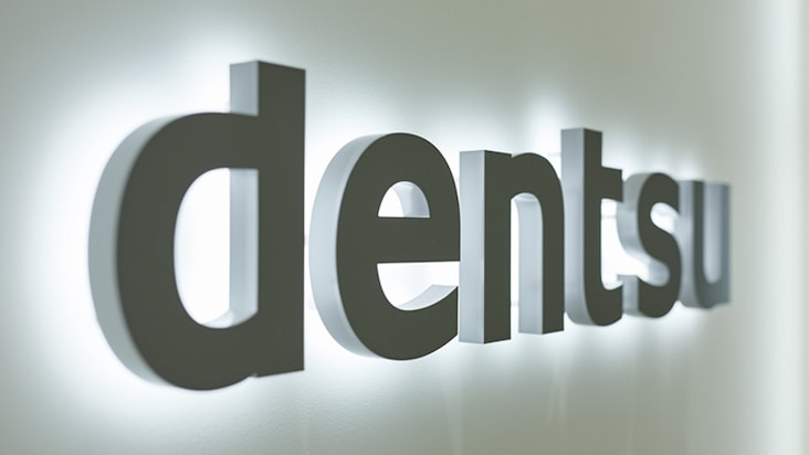 Dentsu CEO pledges overhaul of struggling overseas business; reports 3,400 job cuts