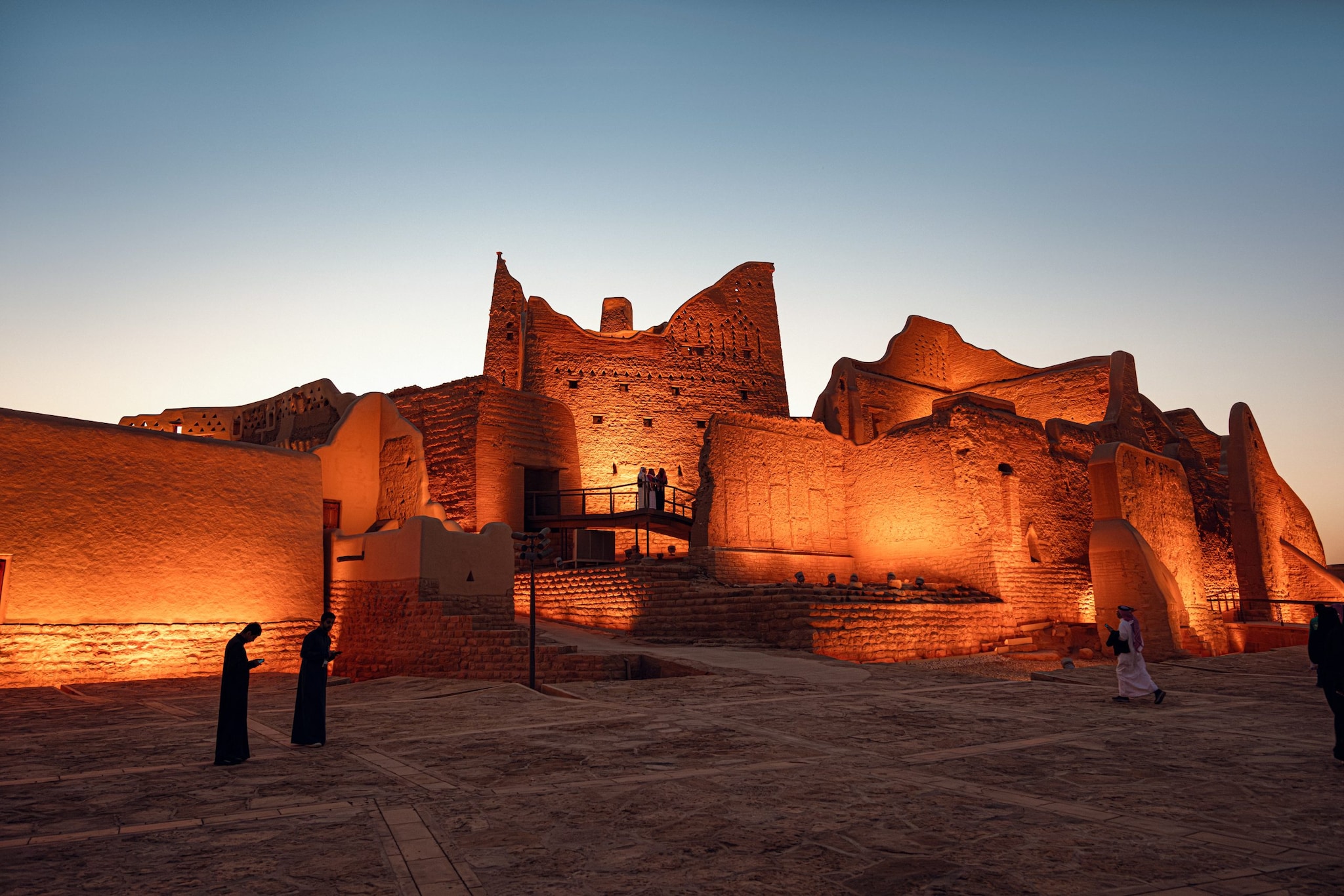 People standing outside the  At-Turaif ,UNESCO World Heritage Site.