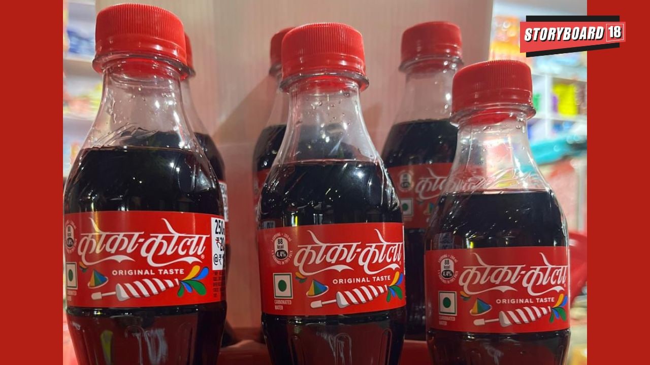 The iconic Coca-Cola label is now in Hindi, with the brand name written in the Devanagari script.