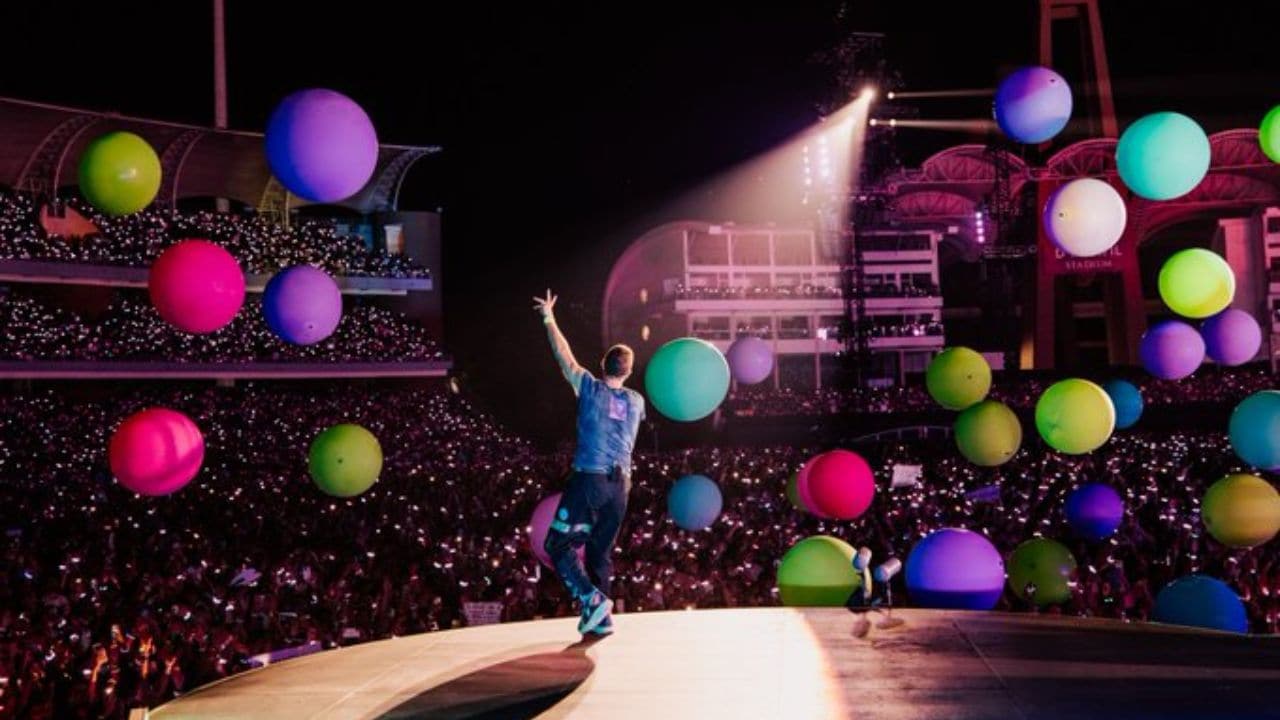 Coldplay band's lead singer Chris Martin performs at Mumbai's DY Patil stadium on 21 January.