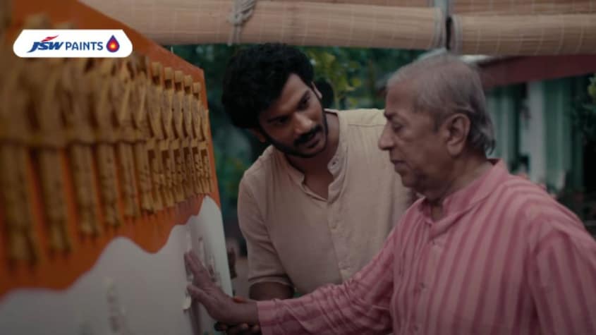 The son guides his visually impaired father’s hand across the painting to help him experience the national flag. The film closes with a note, “Khoobsurti, jo dil ki aankhon se bhi dekhi ja sake.” (Snippet from the film)
